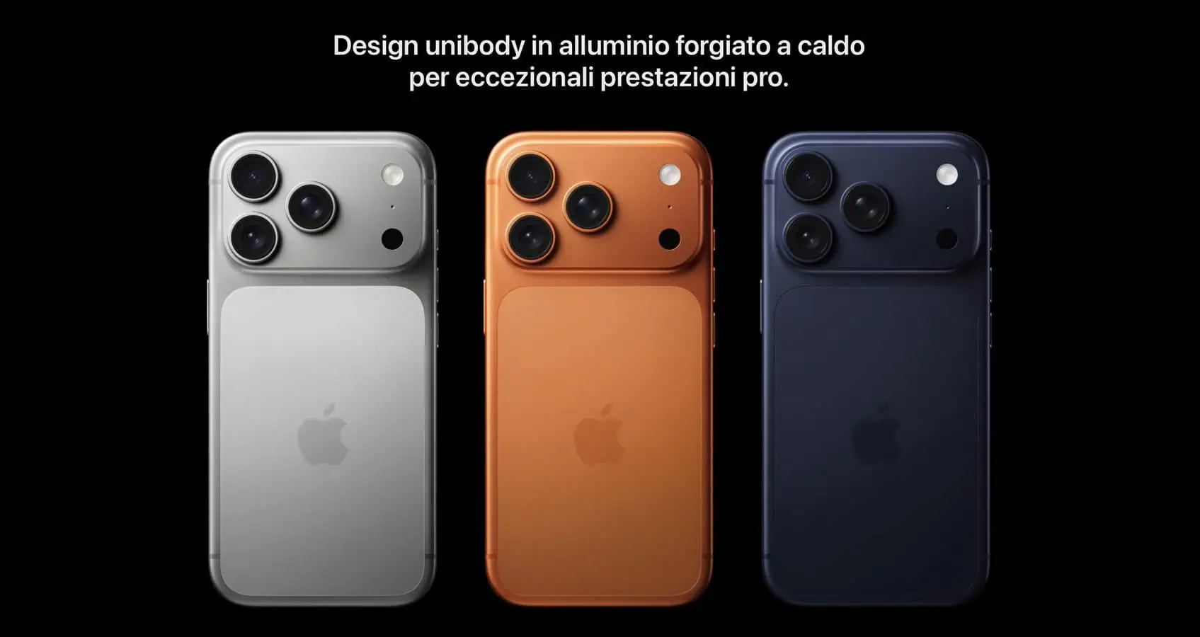 Tre iPhone nei colori argento, arancione e blu scuro sono affiancati su uno sfondo nero, evidenziando il design elegante dell'iPhone.