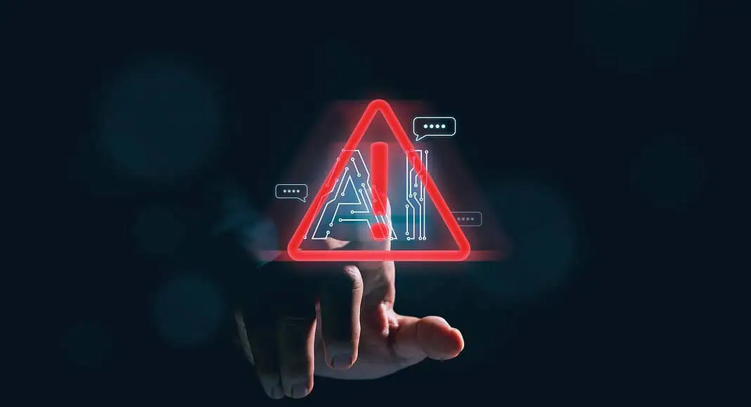 Una mano indica un triangolo di avvertimento rosso incandescente con il testo 