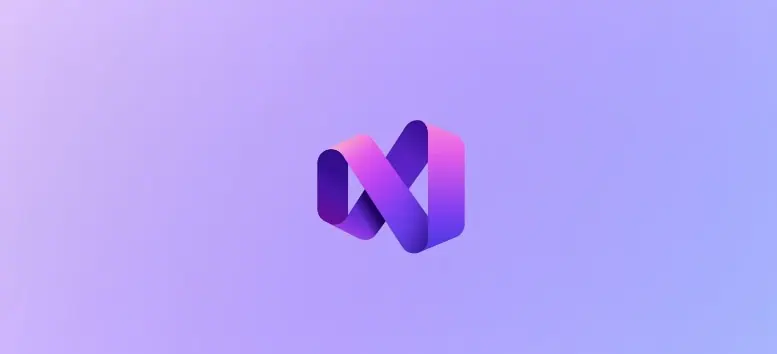 Logo Visual Studio 2026 viola e rosa su sfondo viola chiaro sfumato.