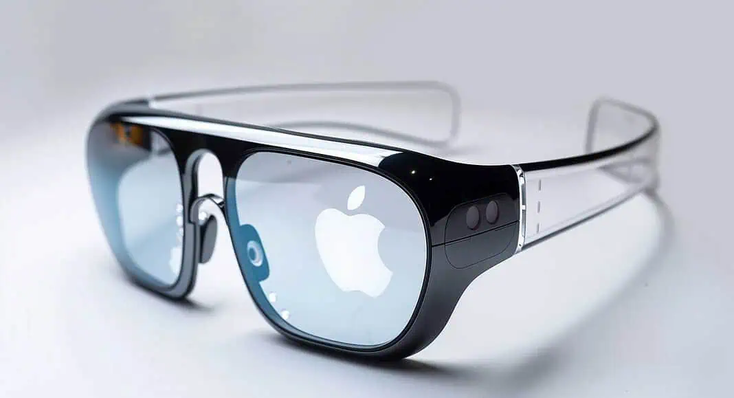 Futuristici occhiali intelligenti neri con il logo Apple riflesso sulla lente, su sfondo bianco, che emanano l'innovativo stile Apple.