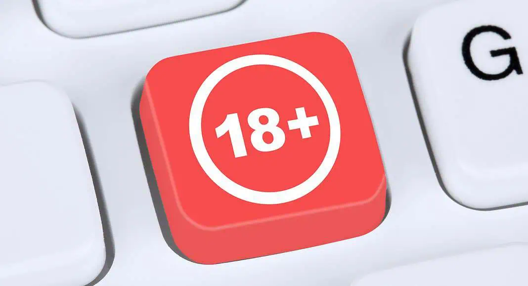 Un tasto rosso della tastiera con un simbolo bianco 